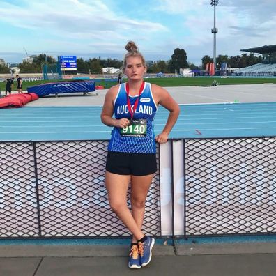 Tayla Clement poses with a medal.