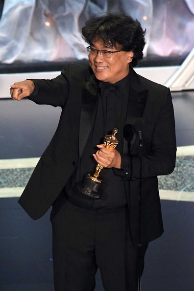 Bong Joon-ho accepts the International Feature Film award for 'Parasite' onstage during the 92nd Annual Academy Awards at Dolby Theatre on February 09, 2020. 
