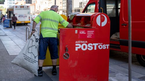 Australia Post has blamed a system error for producing 'non-compliant' stamps for some customers.