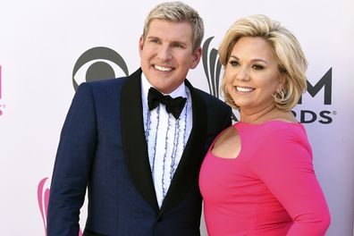 Julie Chrisley, right, and her husband Todd Chrisley 