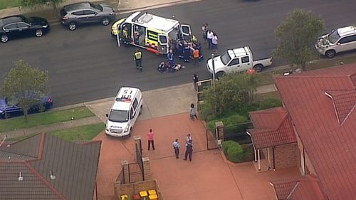 Paramedics have rushed to a premise in Sydney’s west following reports a toddler has been injured in an accident involving a roller door.