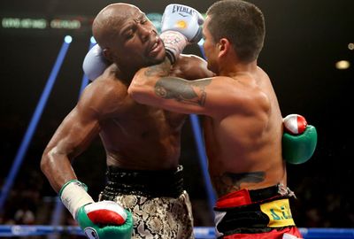 <b>Champion boxer Floyd Mayweather has claimed his 47th straight fight by beating Argentine slugger Marcos Maidana in a bad-tempered rematch that was marred by bite claims.</b><br/><br/>Mayweather, who hasn't lost a fight since the 1996 Olympics, successfully defended his World Boxing Association and World Boxing Council welterweight belts and the WBC junior middleweight belt in a unanimous points decision.<br/><br/>But the bout was engulfed in controversy as Mayweather accused Maidana of biting him.<br/>