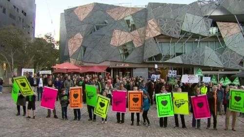 Protesters at the Melbourne landmark this evening.