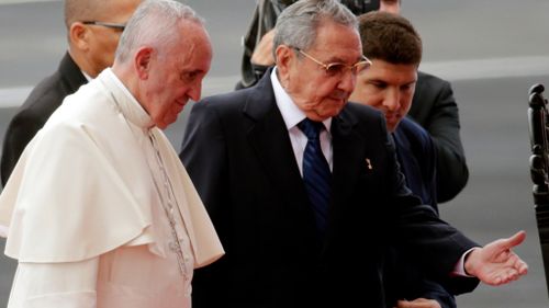 Pope Francis greeted by Cuban president Raul Castro
