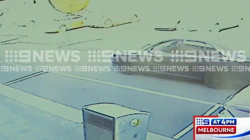 Kilpatrick was seen entering the store, being unable to use the till when the employee fled to a back room and then leaving the scene with a bottle of alcohol in a waiting Commodore. Picture: 9NEWS.