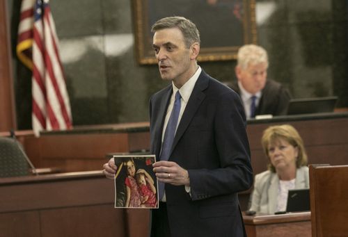 11th Circuit Solicitor Rick Hubbard delivers closing arguments, showing pictures of the Jones children during the sentencing phase of the trial of Timothy Jones Jr. (Tracy Glantz/The State via AP, Pool)