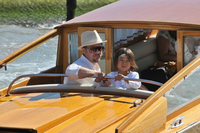 Brad Pitt and their adopted son Pax Thien Jolie-Pitt take a watercraft from Venice Marco Polo Airport ahead of the 65th Venice Film Festival on August 26, 2008 in Venice, Italy.