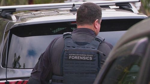 Police raided a home on a suburban street yesterday afternoon.