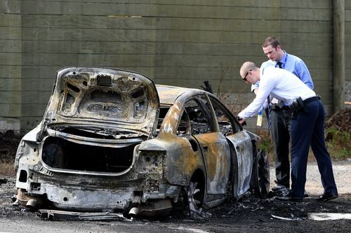 A burned out car was found close to the scene of the shooting. (9NEWS)