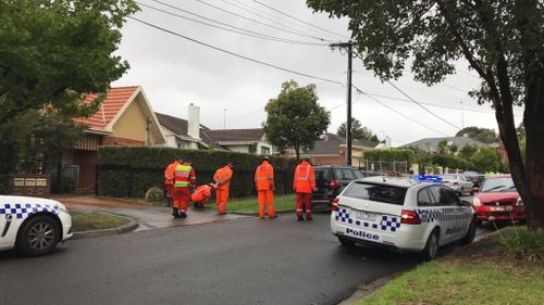Gunman on the run after two men shot on Melbourne street