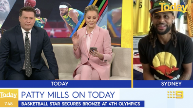 Karl Stefanovic listened oblivious to the fact Ally Langdon was about to read his message.