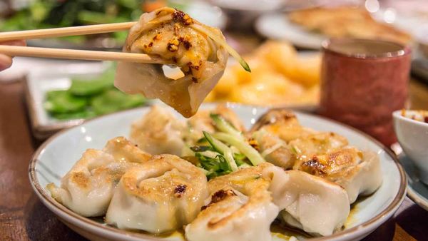 Shepherd's purse and pork wontons with chilli oil, peanut and sesame sauce recipe by New Shanghai