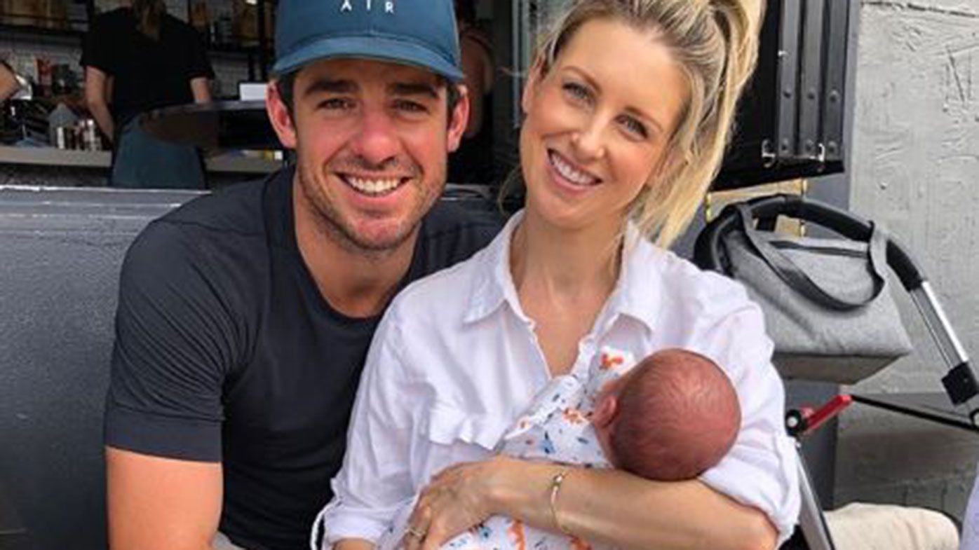 Moises Henriques with wife Krista and son Archie.