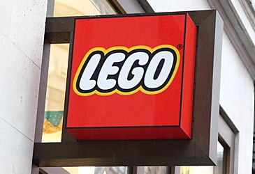 What does the Danish phrase "leg godt", from which the name Lego is derived, mean?