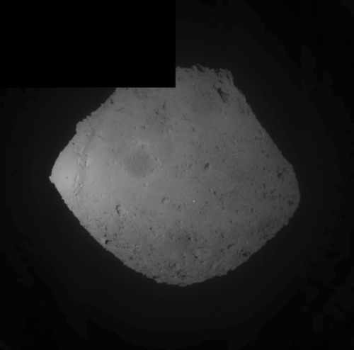 This image released by the Japan Aerospace Exploration Agency (JAXA) shows the asteroid Ryugu. Japan's space agency JAXA said its Hayabusa2 spacecraft released an explosive onto the asteroid to make a crater on its surface and collect underground samples.