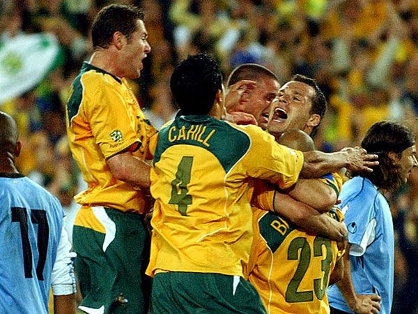 The Socceroos swamp Mark Bresciano in 2005. (AAP)