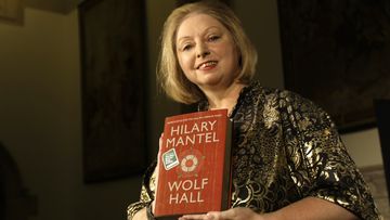Winner of the 2009 Booker Prize for fiction Hilary Mantel with their book &#x27; Wolf Hall &#x27; poses for photographers following the announcement in central London, on October 6, 2009. 