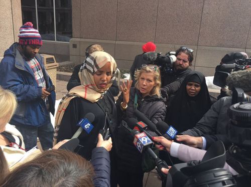 Community activist Kiman Ugas spoke to reporters outside the court after Noor's first appearance. (Twitter/Fox News)