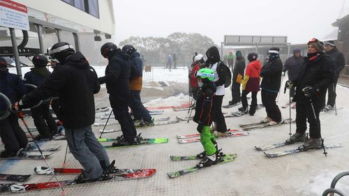 Patrons line up to get on the ski lift at Mt Buller Ski Resort earlier this week.