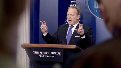 Sean Spicer at the podium. (AAP)