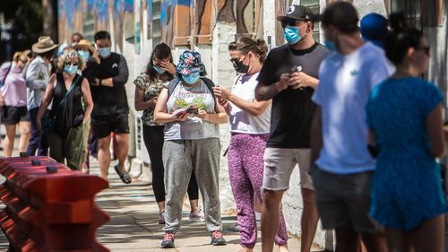 A similar situation was happening in Victoria, with huge queues of people lining up at a COVID-19 testing clinic in Collingwood. 