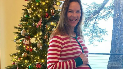 hilary swank baby bump on christmas