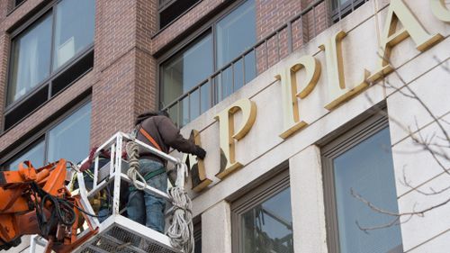 Trump signs removed from apartment buildings in New York City 