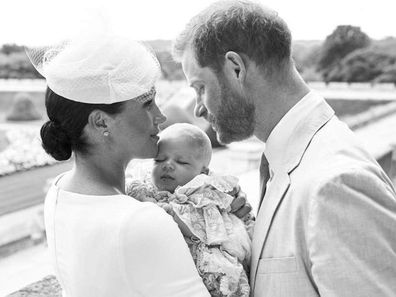 Meghan and Harry cradling Archie at his christening.