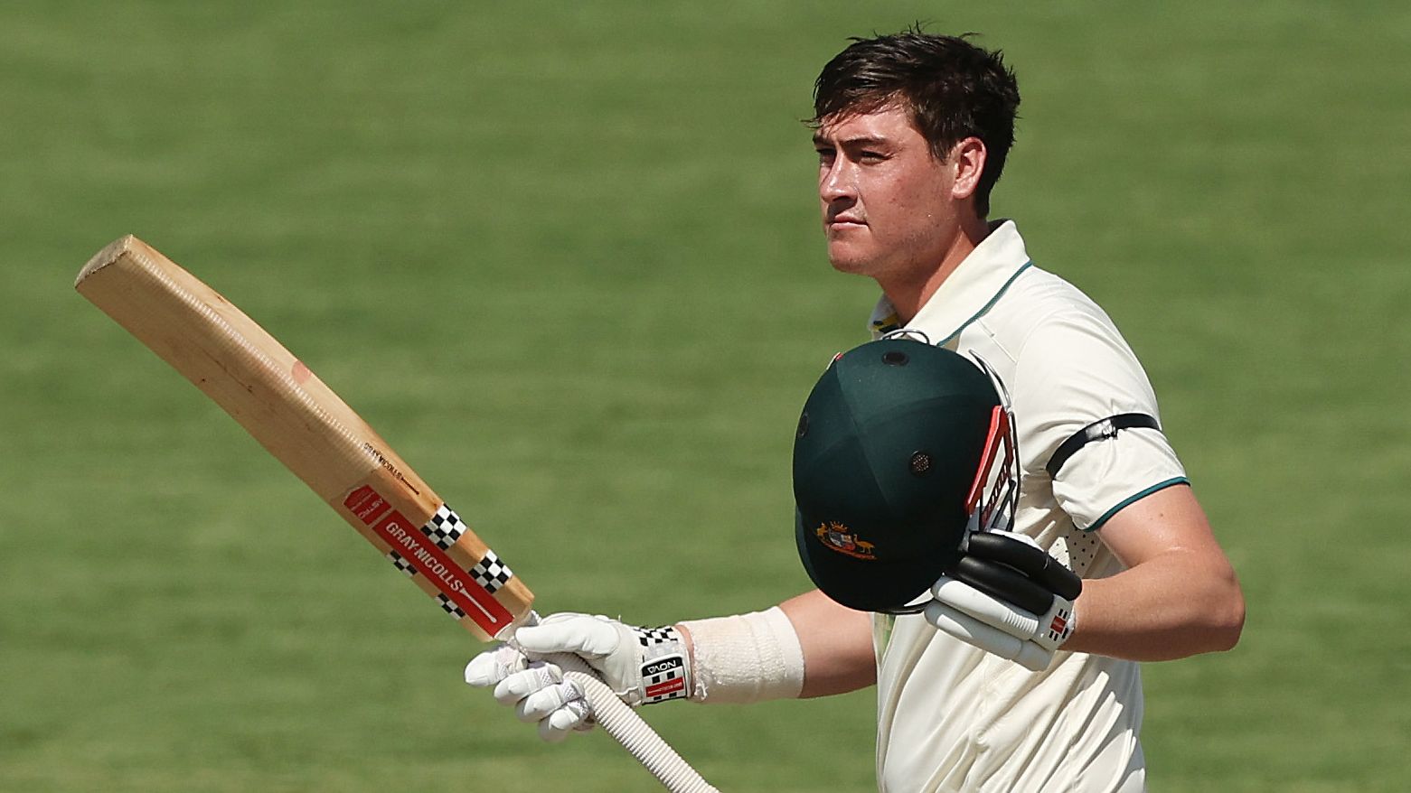 Matt Renshaw celebrates his century for the Prime Minister&#x27;s XI in Canberra.