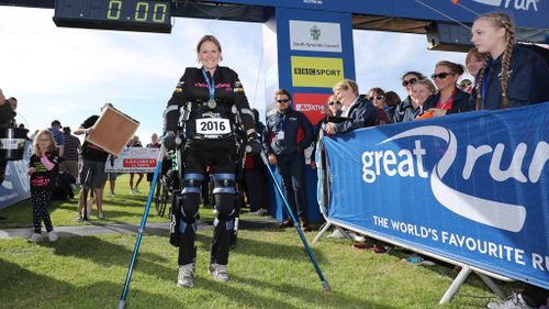 Paralysed pregnant woman completes English half-marathon in ‘bionic’ suit