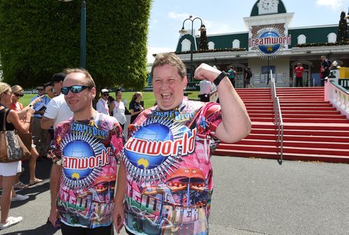 Craig and Deborah McGill pose for the media as they arrive at Dreamworld on the Gold Coast, Saturday, Dec. 10, 2016. The amusement park has been closed for the past six weeks while authorities investigated the death of four people. (AAP)