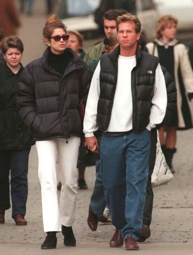 Val Kilmer and Cindy Crawford  take a walk on Kuznetski Street April 13, 1996. Kuznetski Street one of the more fashionable streets of Moscow . 