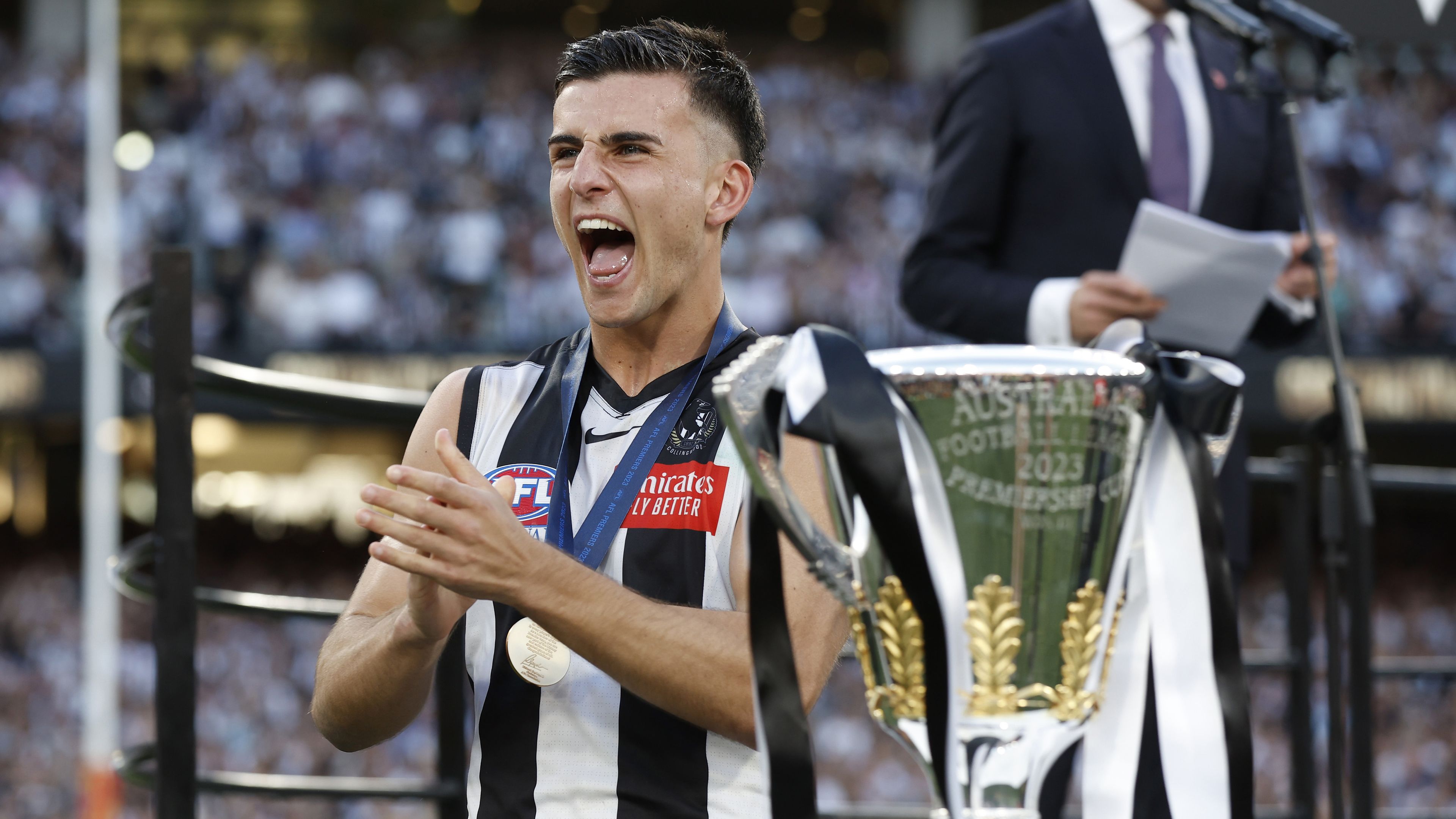 MELBOURNE, AUSTRALIA - SEPTEMBER 30: Nick Daicos of the Magpies celebrates after the 2023 AFL Grand Final match between Collingwood Magpies and Brisbane Lions at Melbourne Cricket Ground, on September 30, 2023, in Melbourne, Australia. (Photo by Darrian Traynor/AFL Photos/via Getty Images)