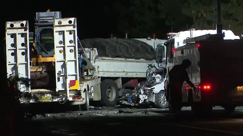 The driver of a suspected stolen taxi was killed when he crashed the vehicle into a truck on the Bells Line of Road at Bilpin, west of Sydney. Picture: 9NEWS.