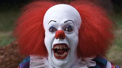 Pennywise in the 1990 original film, played by Tim Curry. (IMDB)
