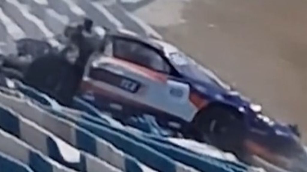 Investigation launched after near-death crash sees car vault safety barriers into vacant grandstand