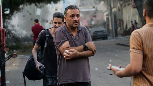 An injured man as a result of Israeli airstrikes