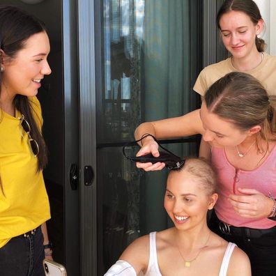 Teen cancer patient Molly Dawson shaves her hair.