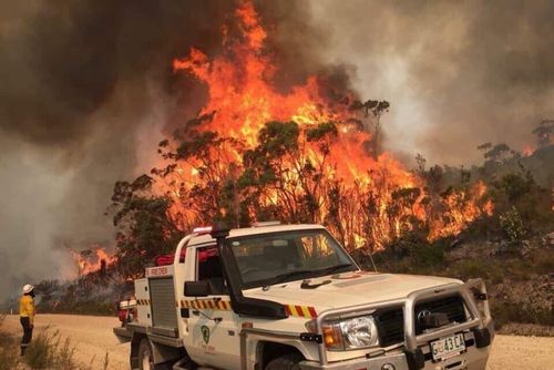 Fire crews are focusing on two major bushfires, with more than 30 still raging.