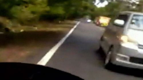 Dashcam footage shows O'Brien swerving around a truck.
