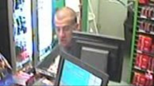 A man who police believe can help with their inquiries into a robbery at a Sunbury service station. (Supplied)