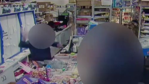 The owner bravely fought back after the thieves stormed his business. (9NEWS)