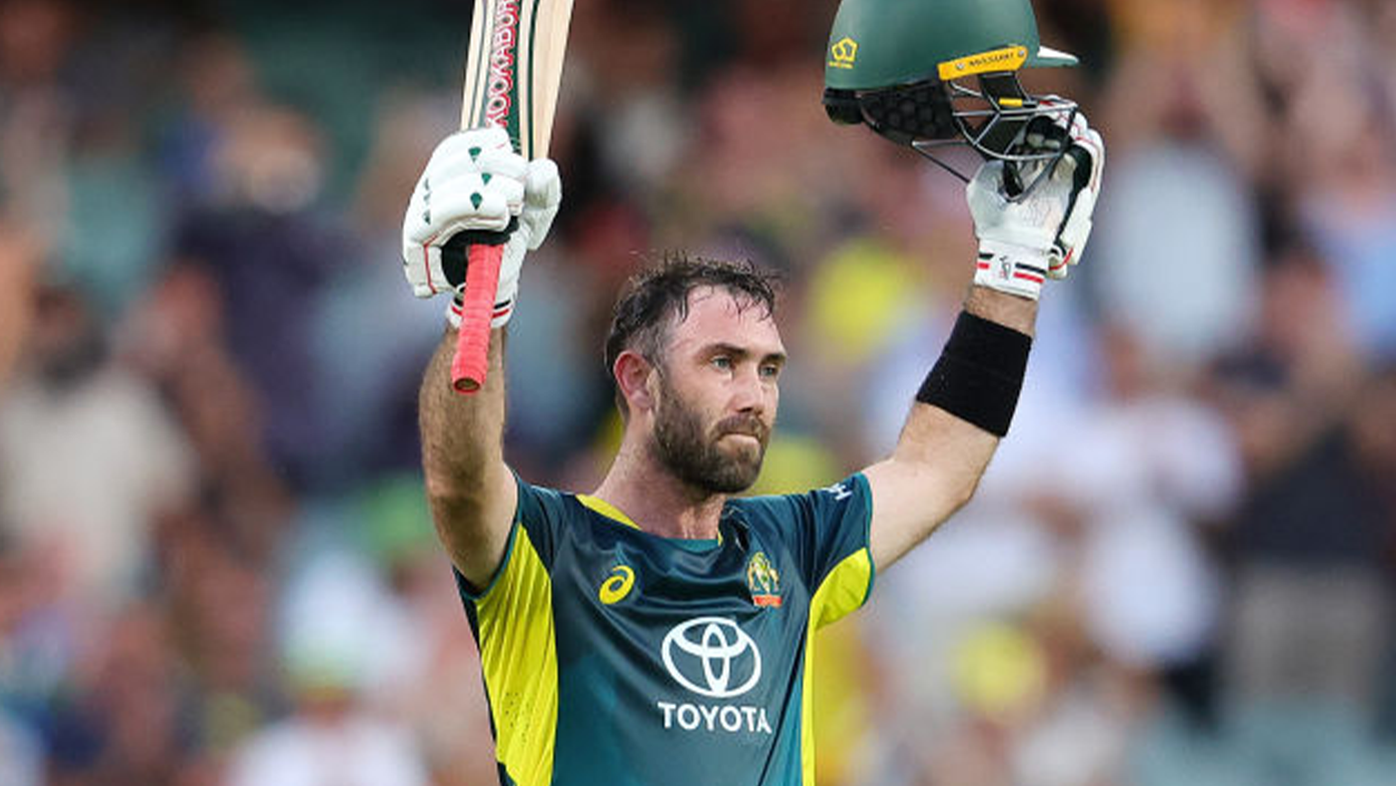 Glenn Maxwell celebrates his record-equalling fifth T20I century.