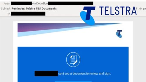 The email uses Telstra branding.