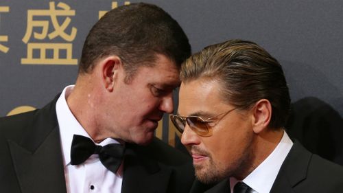 James Packer shares a word with Leonardo DiCaprio on the red carpet. (AAP)