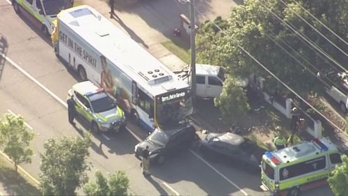 A bus has slammed into three parked cars in Brisbane.