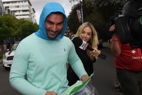 Salim Mehajer leaves jail wearing a blue hoodie and a green jumper - and thongs. Picture: AAP