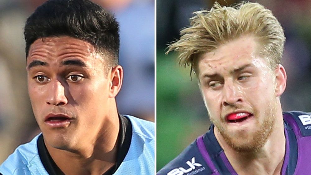 Valentine Holmes (l) and Cameron Munster. (AAP)