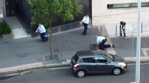 The scene in Parramatta immediately after the cold-blooded shooting.