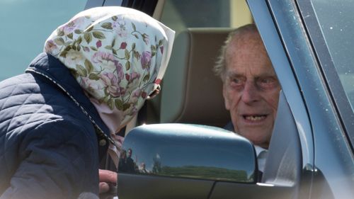 The 96-year-old was pictured behind the driver seat. (Getty)